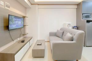 Comfort Living 2BR Kebagusan City Apartment By Travelio