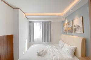 Comfort Living 2BR Kebagusan City Apartment By Travelio