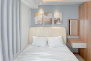 Comfort Living 2BR Kebagusan City Apartment By Travelio
