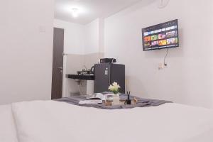 Homey and Cozy Studio at Serpong Garden Apartment By Travelio