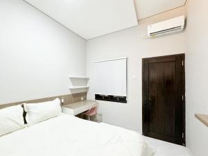 Griya Banyuanyar Syariah Near Graha Saba Buana Mitra RedDoorz