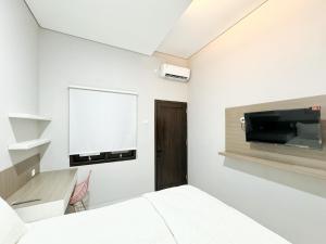 Griya Banyuanyar Syariah Near Graha Saba Buana Mitra RedDoorz