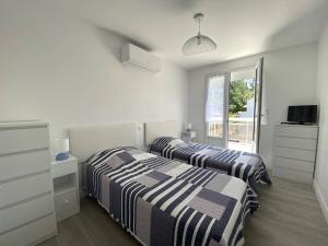 Appartements Saint-Palais : T2 3 etoiles, proche plage, terrasse sud, parking, clim et Wifi - FR-1-738-36 : photos des chambres