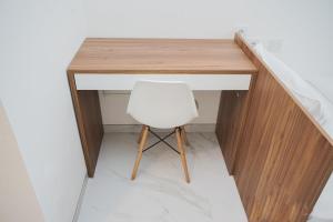 Nice and Comfort Studio Room at Sky House BSD Apartment By Travelio