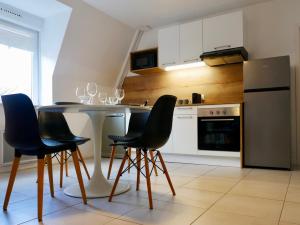 Appartements Experience Malouine - Appt T3-Coeur de Malo-Plage : photos des chambres