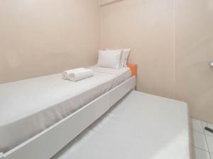 Homey 2BR Apartment Gateway Ahmad Yani Cicadas By Travelio