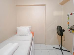 Homey 2BR Apartment Gateway Ahmad Yani Cicadas By Travelio
