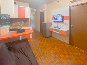 Homey 2BR Apartment Gateway Ahmad Yani Cicadas By Travelio