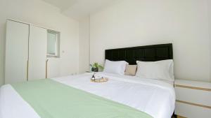 Good and Warm 1BR at Boutique Kemayoran Apartment By Travelio