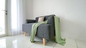 Good and Warm 1BR at Boutique Kemayoran Apartment By Travelio