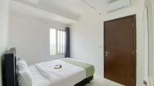 Good and Warm 1BR at Boutique Kemayoran Apartment By Travelio