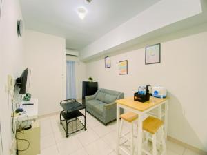 Comfort Stay 2BR Apartment at Springlake Summarecon Bekasi By Travelio