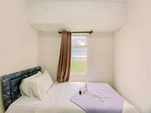 Comfort Stay 2BR Apartment at Springlake Summarecon Bekasi By Travelio