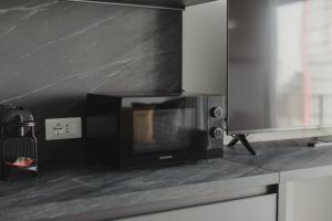 GoHost - Modern and Bright Apartments with Terrace and Balcony