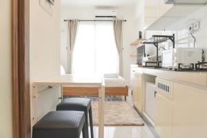 Comfortable Studio at Sky House BSD Apartment next to AEON Mall By Travelio