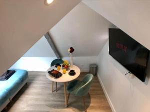 Appartements Mon Saint-Malo - APPART'HOTEL - Coeur de Bayeux : photos des chambres