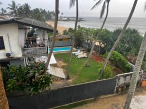 Strandvilla Kandu Haus Yin bei Hikka - Ubytování bez kategorie ve městě Dodanduwa