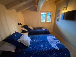Chalets Les Ours de Combloux : photos des chambres