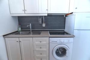 Two bedroom top floor apartment with pool views in Villamartin