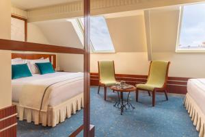 Hotels Hotel Des Grands Voyageurs : photos des chambres
