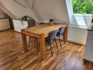 Dachgeschosswohnung 1 - Apartments am Schloss