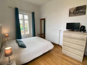 B&B / Chambres d'hotes Les Mariniers Chambres d'Hotes a la campagne avec aire de jeux - Spa nordique en option : photos des chambres