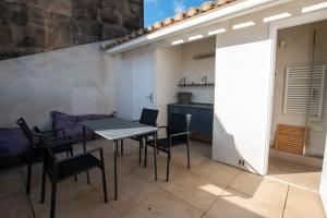 Appartements L'Escale - Clim, Terrasse : photos des chambres