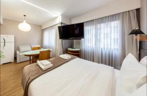 Charmoso Flat em Moema - Próx Congonhas e Ibirapuera - Estacionamento l Café opcional pago l Pagamento para o Anfitrião