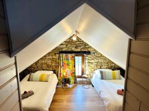 Maisons de vacances La Lande d-Ouee - Sauna & Convivialite : photos des chambres