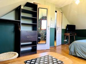 Maisons de vacances La Lande d-Ouee - Sauna & Convivialite : photos des chambres