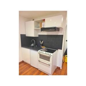 Appartements Gare - Elegant appartement pour pros ou touristes : photos des chambres