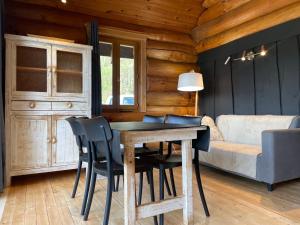 Chalets Chalet avec vue sur le lac : photos des chambres
