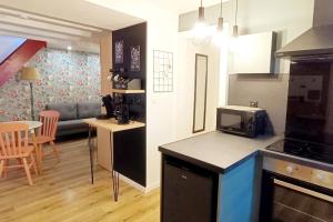 Maisons de vacances Gite de la Halle : photos des chambres