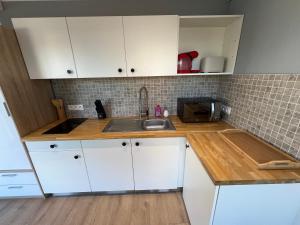 Appartements Conteneur Design Avec Jacuzzi - Bord de Foret : photos des chambres
