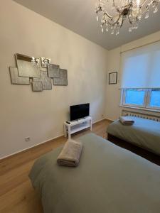 2 Chambres-balcon-salle de bain