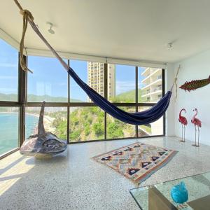 Vista y estilo frente al mar!