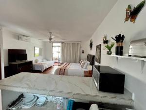 Beautiful Jr Suite in the heart of Puerto Vallarta half a block from the beach