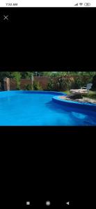 Monoambiente con piscina compartida