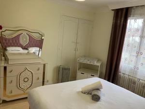 Appartements 3 chambres cozy proche de Paris : photos des chambres