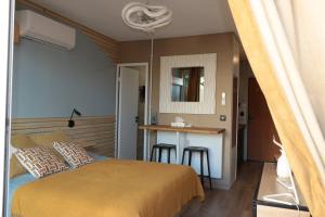 Appartements Studio avec terrasse privative : photos des chambres