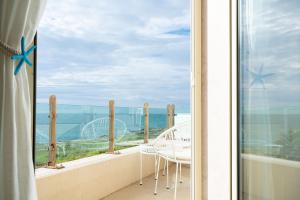 Deluxe Suite with Sea View
