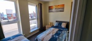 Sunrise Cottage, 2 minutes walk from the beach!