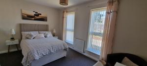 Sunrise Cottage, 2 minutes walk from the beach!