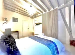 Appartements Maison Hyper Centre Rouen - Patio - TV 4K - WIFI-Fibre - 4 chambres - Machine a laver - Seche linge - Lave Vaisselle - Confort - Spacieux : photos des chambres