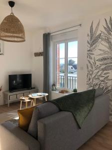 Appartements Appartement de la plage : photos des chambres