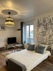 Appartements Appartement de la plage : photos des chambres