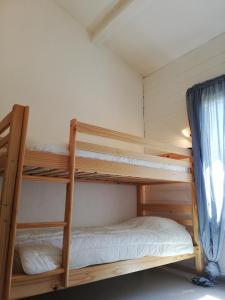 Maisons de vacances Agreable maison calme avec terrasse, jardin et vue sur verger : photos des chambres