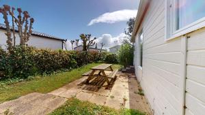 Maisons de vacances Le Chalet de L Auzance - Piscine & Plage : photos des chambres