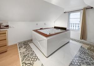 Maisons de vacances Evasion detente avec Jacuzzi Sauna & Billard : photos des chambres