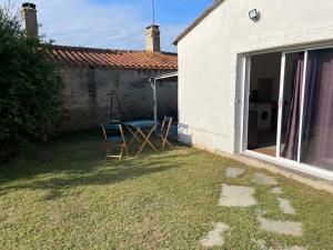 Maisons de vacances Un studio independant avec jardin : photos des chambres